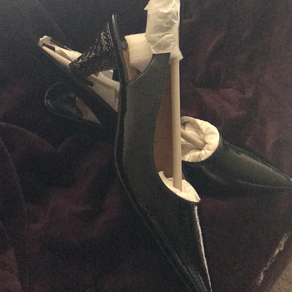 Black patent leather sling back pumps